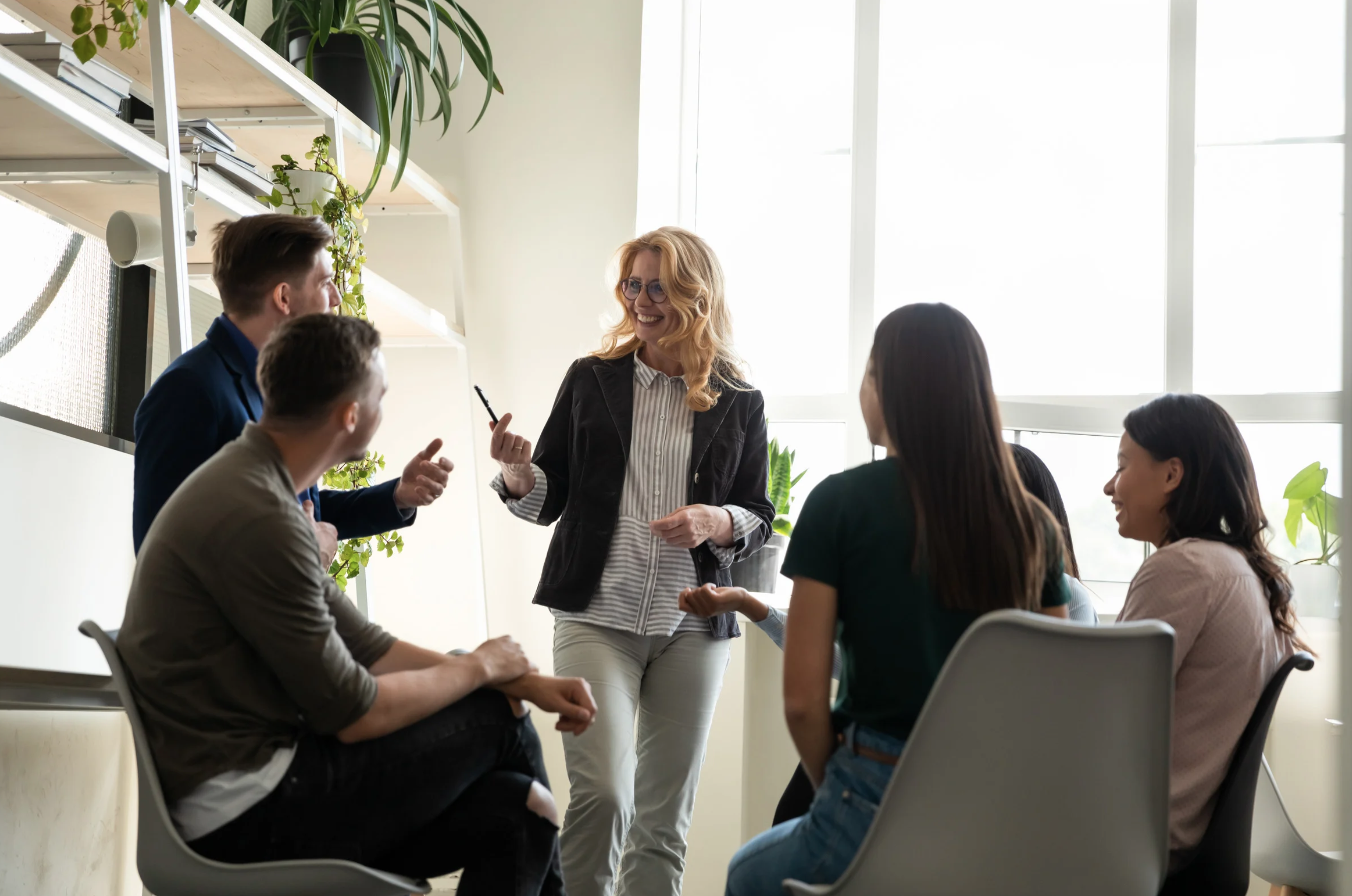 Adults engaged in a workshop discussion